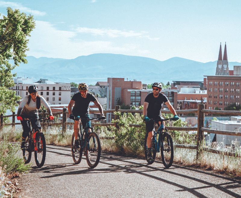 Three bikers on a trail in Helena.